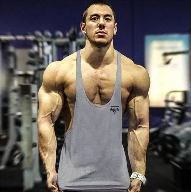2024 New Bodybuilding Stringer Tank Top Men Fitness Clothing Gyms Shirt Brand Muscle vest Workout Cotton Regatas Masculino